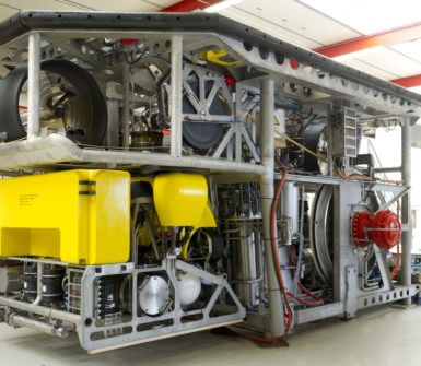 Rockpiper fall pipe ROV with survey ROV in docking position